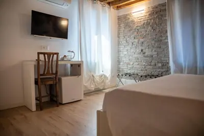 Letto o letti in una camera di Hermes Venice