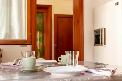 Set per la preparazione di tè e caffè presso Palladio House, spaziosa elegante e centrale