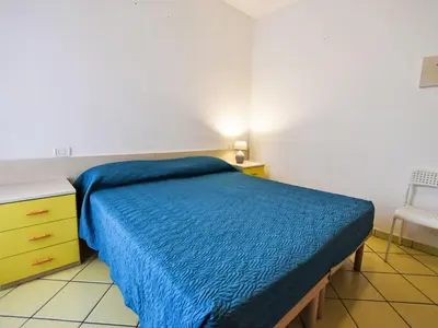 Letto o letti in una camera di Apartment Solmare-53 by Interhome