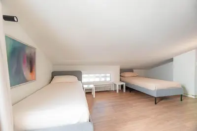 Letto o letti in una camera di Bridge of Angels Apartment