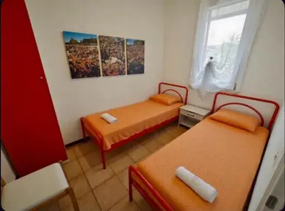 Letto o letti in una camera di Cacciatore