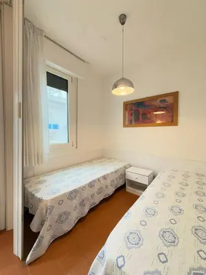 Letto o letti in una camera di RESIDENCE PALMAR -Solo per famiglie -WALTERIGATO APARTMENTS
