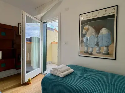 Letto o letti in una camera di Cà d'Oro