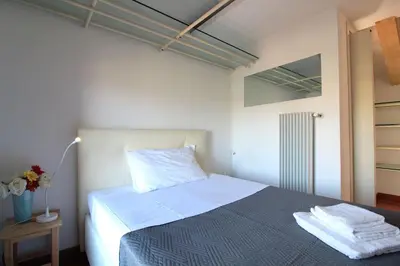 Letto o letti in una camera di Silea Apartments, Pool, Garden, Treviso