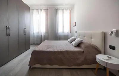 Letto o letti in una camera di Celestia Terrazza Canal View