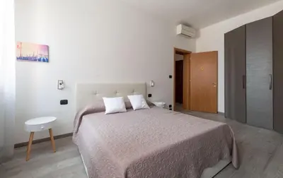 Letto o letti in una camera di Celestia Terrazza Canal View