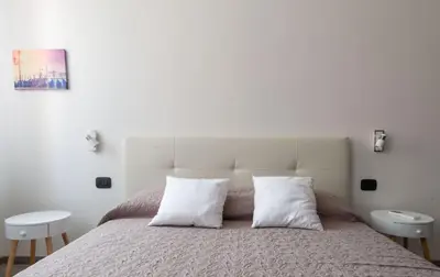 Letto o letti in una camera di Celestia Terrazza Canal View