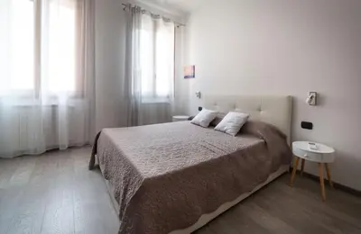 Letto o letti in una camera di Celestia Terrazza Canal View