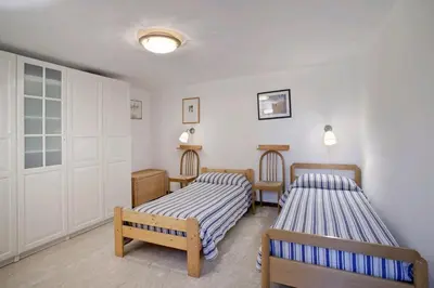 Letto o letti in una camera di Stefano F3 - LOCAPPART