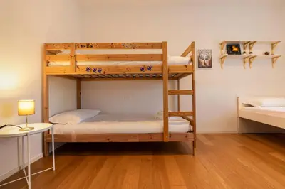 Letto o letti in una camera di Francesco & Giulia - attico n 11 Treviso Stazione
