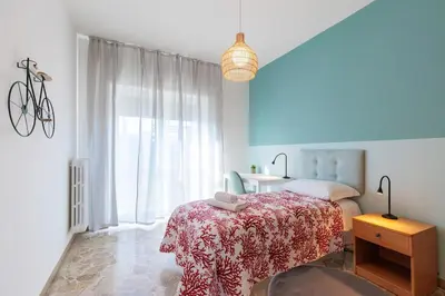 Letto o letti in una camera di Signorile appartamento in Mestre 1 Min from Tram to Venice