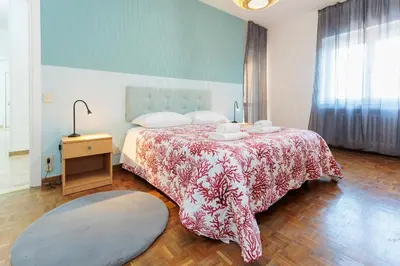 Letto o letti in una camera di Signorile appartamento in Mestre 1 Min from Tram to Venice