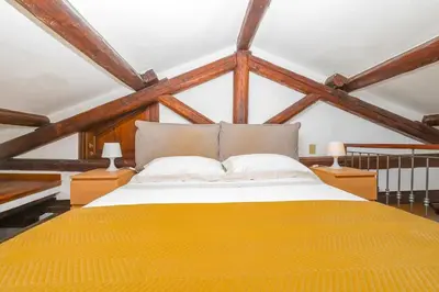 Letto o letti in una camera di Dimora Collegio San Marco