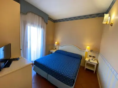 Letto o letti in una camera di Il Ghebo