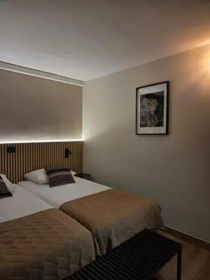 Letto o letti in una camera di Tilly's Locanda