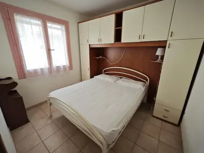 Letto o letti in una camera di Lara