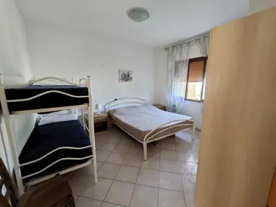Letto o letti in una camera di Ketty