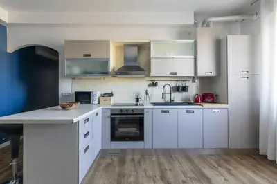 Cucina o angolo cottura di Cozy Apt - Close to City Center and Train Station
