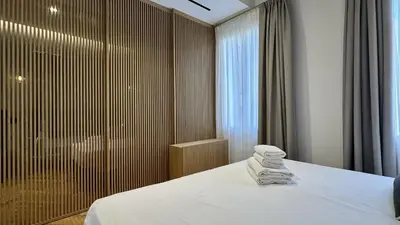 Letto o letti in una camera di Rialto Prestige Canal View