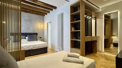 Letto o letti in una camera di Rialto Prestige Canal View