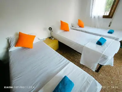 Letto o letti in una camera di 晨光之家