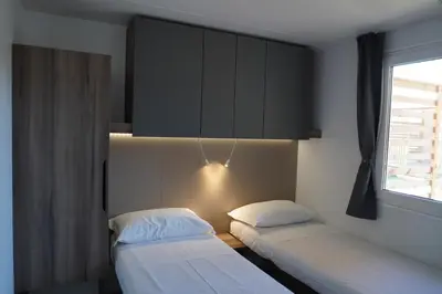 Letto o letti in una camera di Camping Village Adriatico