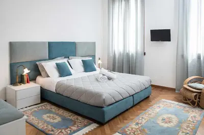 Letto o letti in una camera di B&B Villa Romano