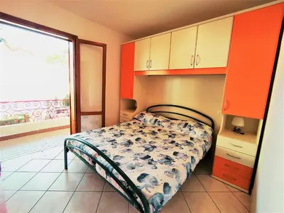 Letto o letti in una camera di RESIDENCE El Patio C-4