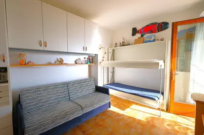 Letto o letti in una camera di La Torre monolocale vista mare