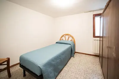 Letto o letti in una camera di Dimora Alba di Mare - Isola di Pellestrina Ve