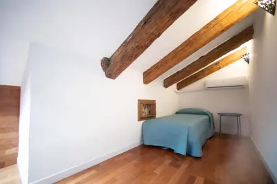 Letto o letti in una camera di Dimora del Pescatore - Isola Di Pellestrina VE