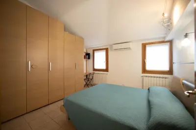 Letto o letti in una camera di Dimora del Pescatore - Isola Di Pellestrina VE