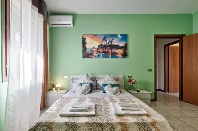 Letto o letti in una camera di Venice Miramare Residence 2