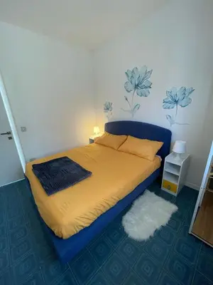Letto o letti in una camera di tiny house appartamento x2