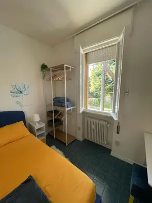 Letto o letti in una camera di tiny house appartamento x2