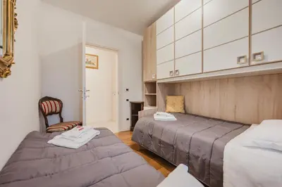 Letto o letti in una camera di Lucrezia Suite - 10 min from Venice & Free Parking