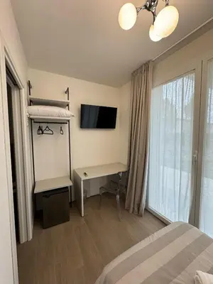 Letto o letti in una camera di Hotel Villa Mary
