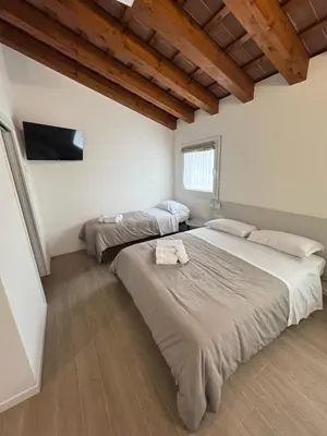 Letto o letti in una camera di Hotel Villa Mary