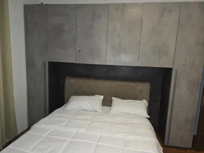 Letto o letti in una camera di B&B Via Pitagora