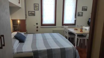 Letto o letti in una camera di Nido in centro - no ztl - zona Università, piano 1 con ascensore, clima e wi-fi - Keki