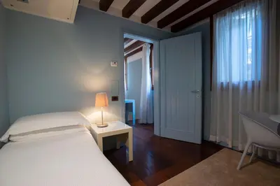Letto o letti in una camera di Casa Kirsch