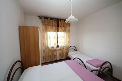 Letto o letti in una camera di Flat 150m from the beach of Rosolina