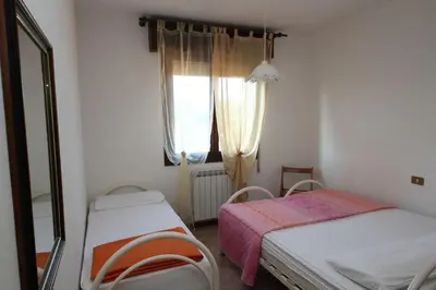 Letto o letti in una camera di Flat 150m from the beach of Rosolina