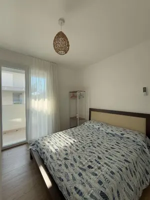 Letto o letti in una camera di GREEN APARTMENT-Solo per famiglie-WALTERIGATO APARTMENTS
