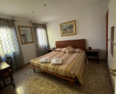 Letto o letti in una camera di Ca' Coppo