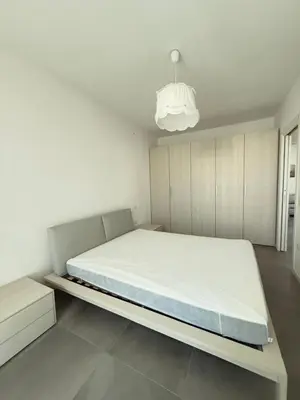 Letto o letti in una camera di RESIDENCE WAVE 1-Solo per famiglie- WALTERIGATO APARTMENTS