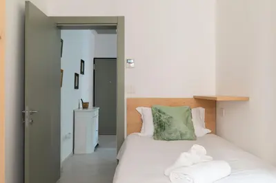 Letto o letti in una camera di Secret Rose Garden in the heart of Padua