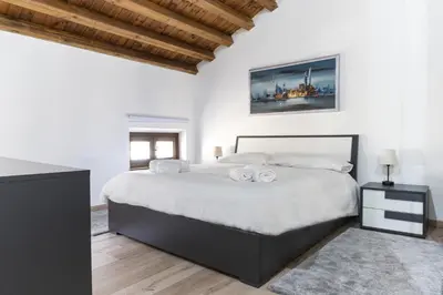 Letto o letti in una camera di Casa Vittoria