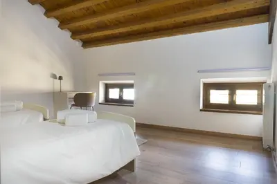 Letto o letti in una camera di Casa Vittoria