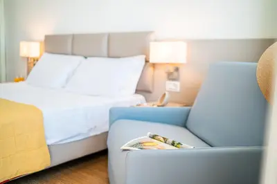 Letto o letti in una camera di Hotel Astor